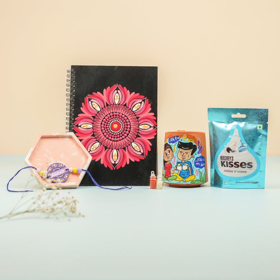Personalized Handmade Rakhi Hamper For Brother Includes 1 Rakhi 1 Diary 1 Mug 1 Coaster And Chocolate - Front View with Multiple Items