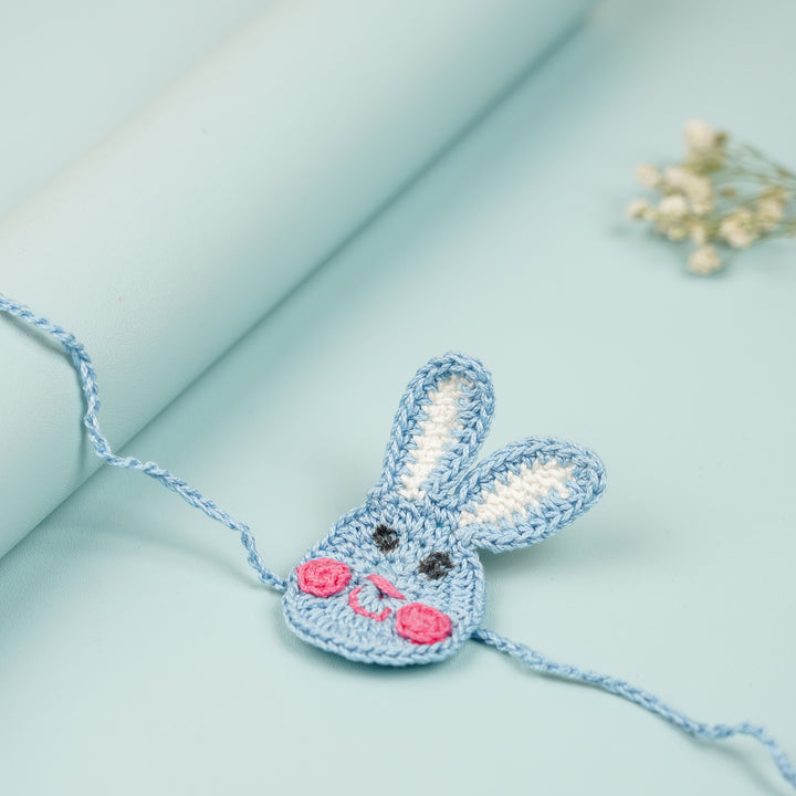 Handmade Crochet Bunny Theme Kids Rakhi With Roli Chawal - Side View Showing Depth
