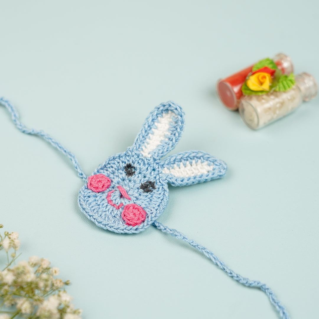 Handmade Crochet Bunny Theme Kids Rakhi With Roli Chawal - Front View Crochet Bunny Wristband