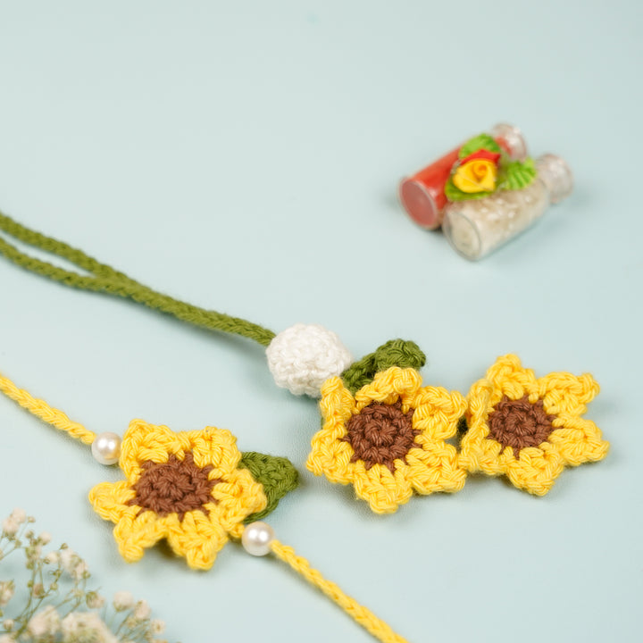 Handmade Crochet Sunflower Bhaiya Bhabhi Rakhi With Roli Chawal Set Of 2 - Flat Lay of Two Sunflower Bracelets