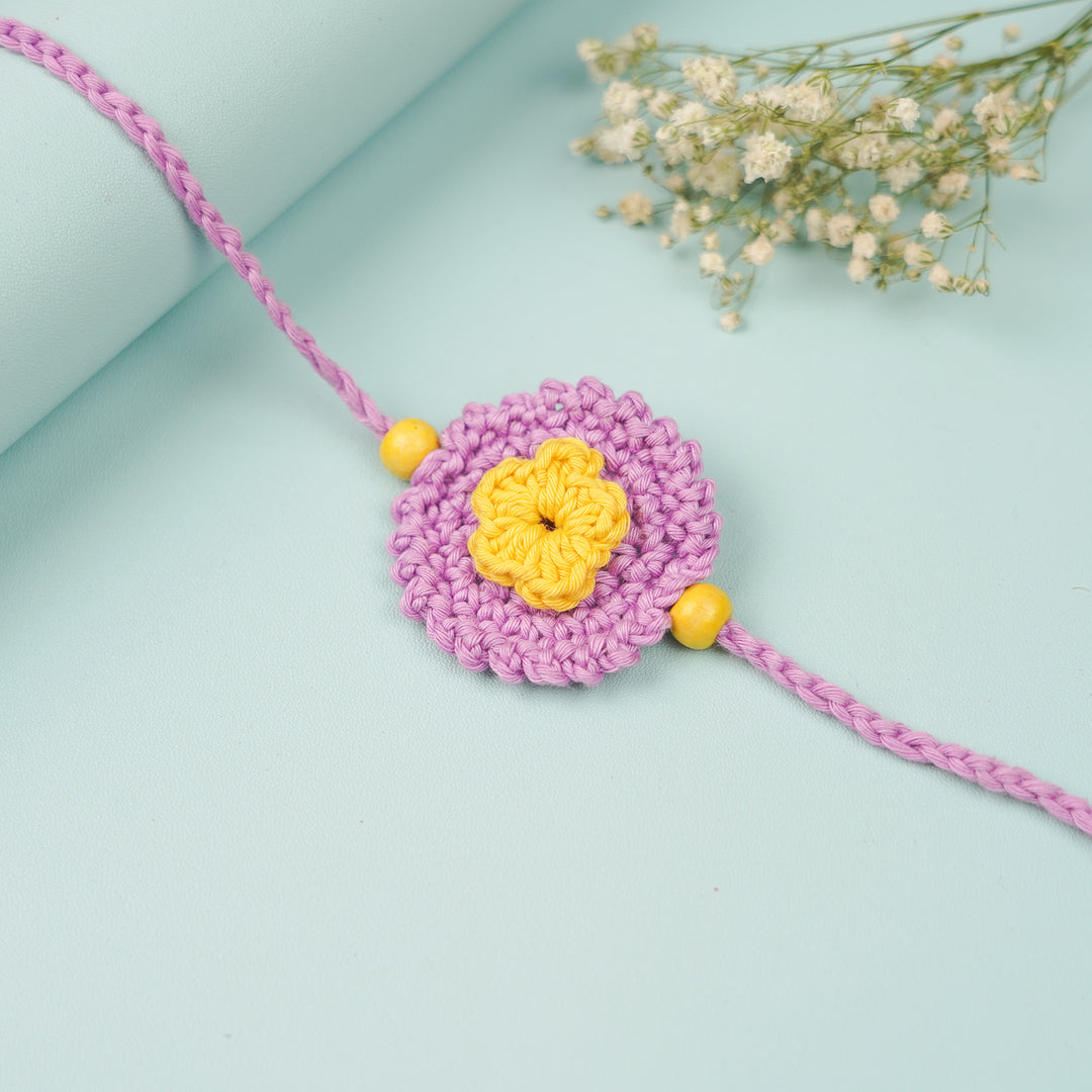 Handmade Crochet Round Mini Floral Rakhi With Roli Chawal - Close-up of single rakhi