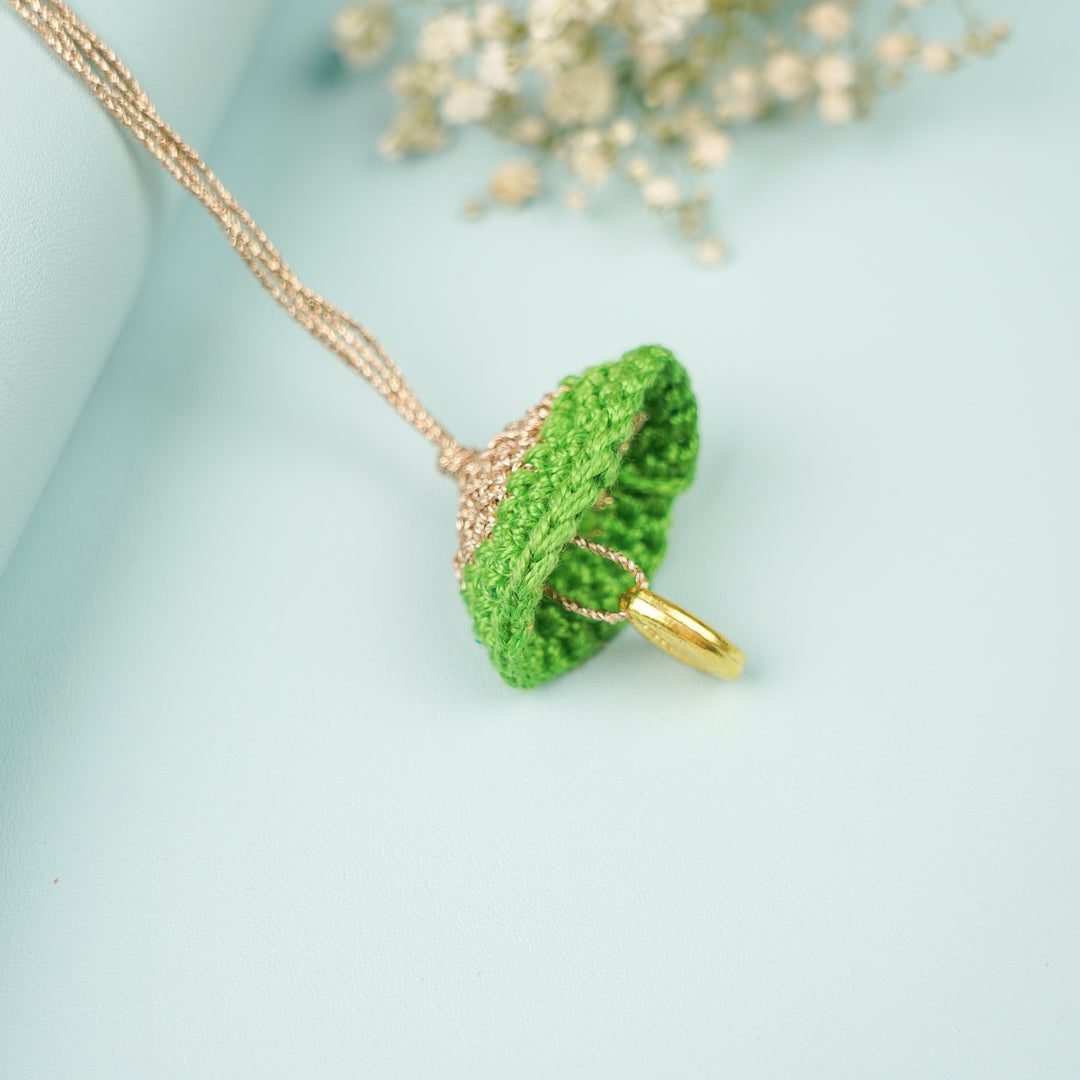 Handmade Crochet Cowry Beaded Lumba Rakhi For Bhabhi With Roli Chawal - Necklace Side View Green