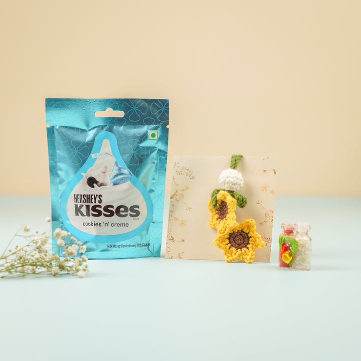 Handmade Crochet Sunflower Lumba Rakhi For Bhabhi With Roli Chawal - Styled with gift packaging and props