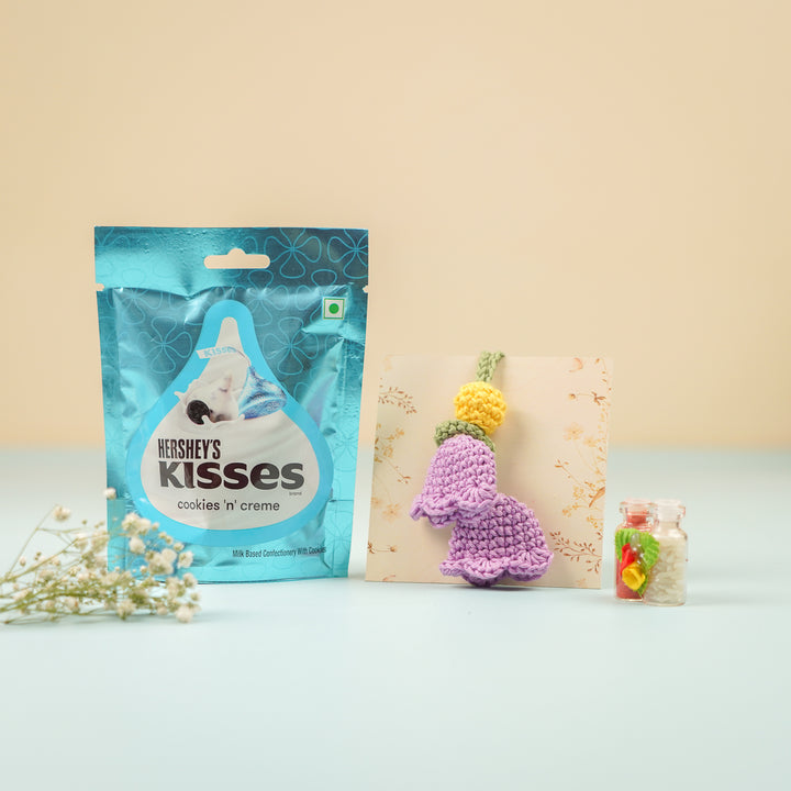 Handmade Crochet Tulip Lumba Rakhi For Bhabhi With Roli Chawal - Product Display with Packaging and Props