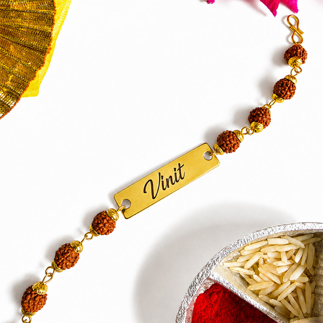 Personalized Adjustable Printed Rudraksha & Golden Bead Bracelet Rakhi With Roli Chawal For Brother