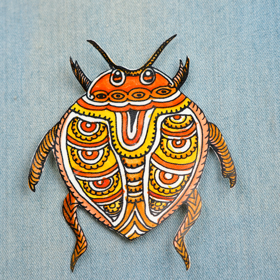 Hand-Painted Orange Beetle Tholu Bommalata Fridge Magnet