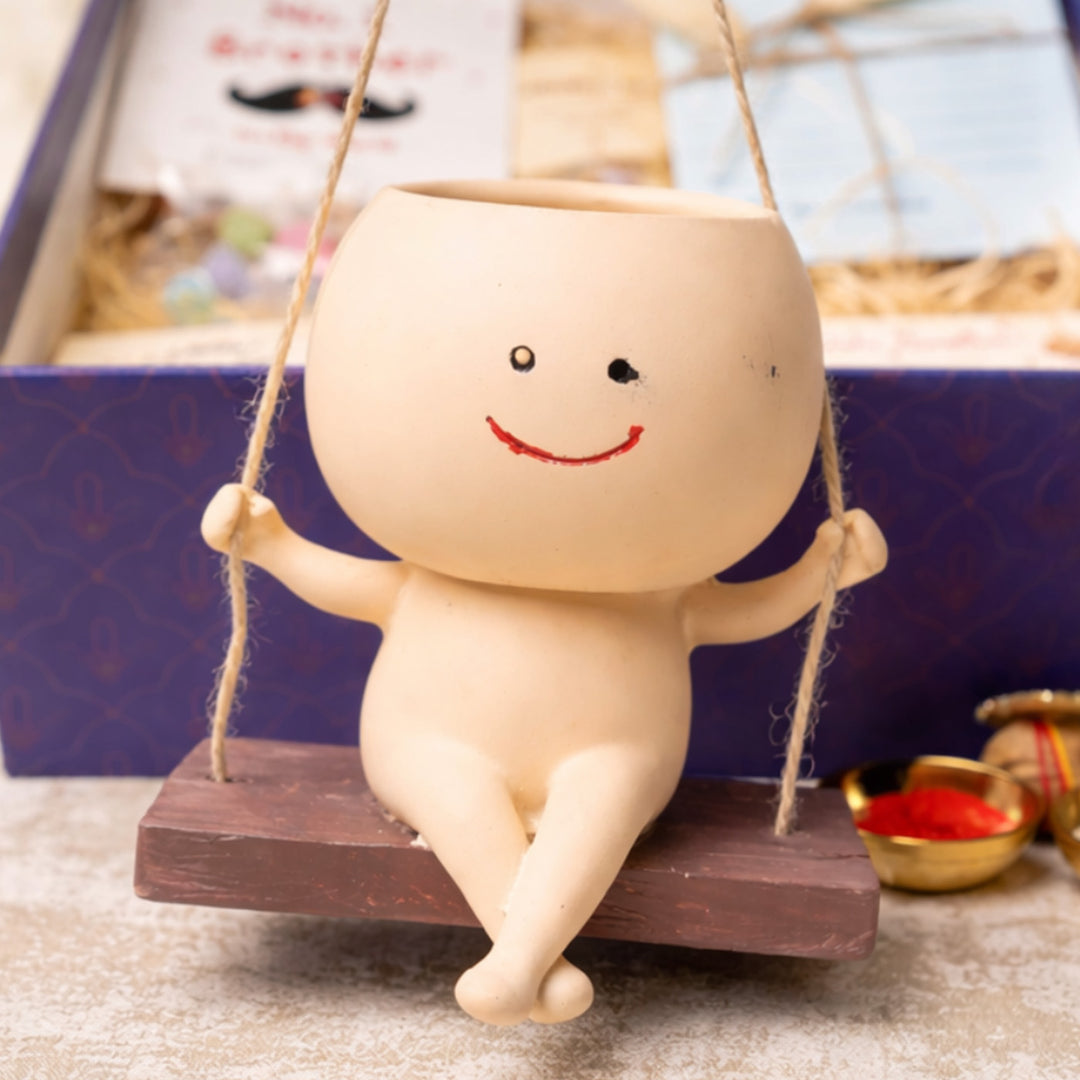 "Planter Paglu" Decorative Resin Planter Rakhi Hamper With Rakhi Set & Roli Chawal For Bhaiya Bhabhi