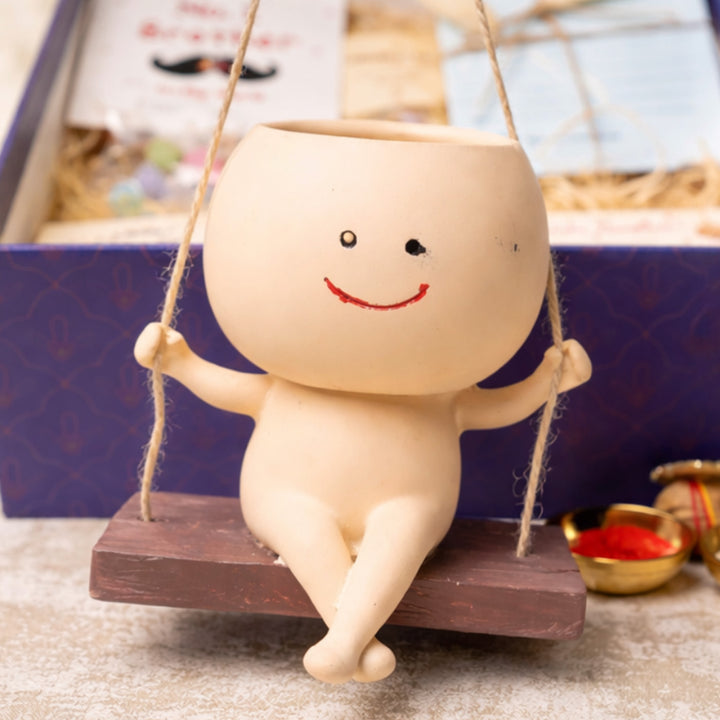 "Planter Paglu" Decorative Resin Planter Rakhi Hamper With Rakhi Set & Roli Chawal For Bhaiya Bhabhi