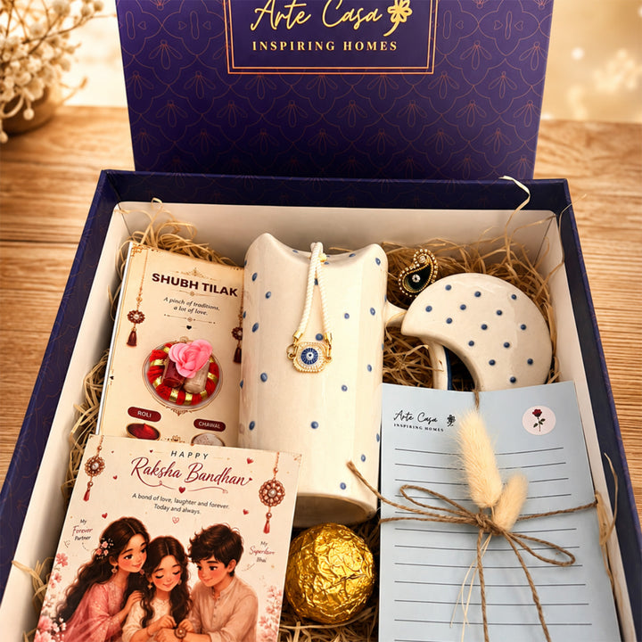 Blue Ceramic Sipper Rakhi Hamper With Steel Straw & Roli Chawal For Brother