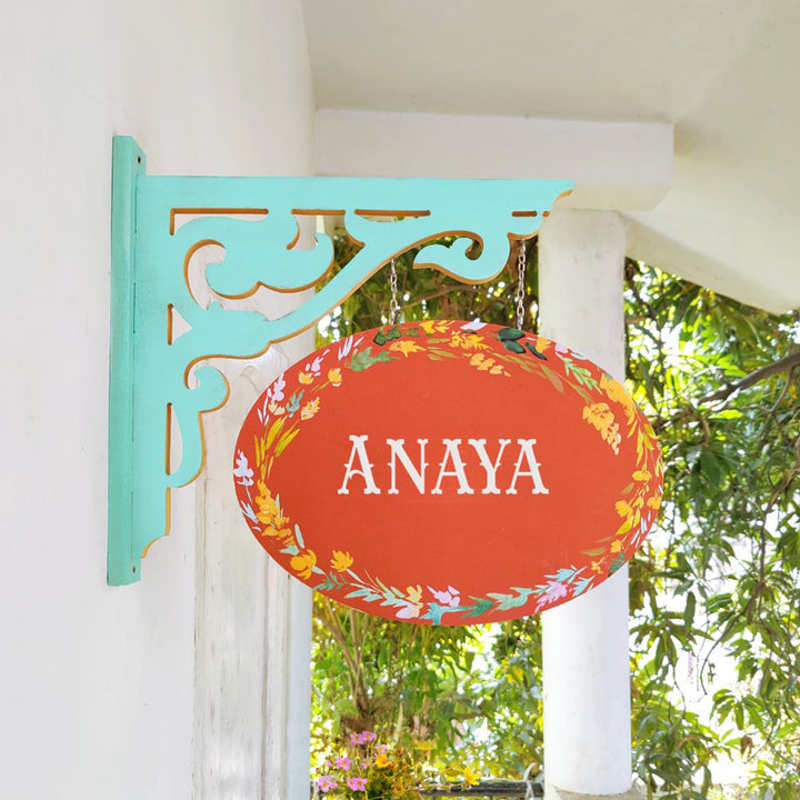 Hand Painted Oval Hanging Floral Name Plate 4 - Side View Hanging on Bracket