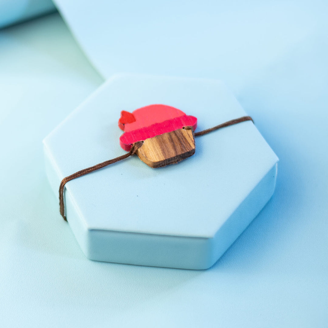 Handpainted Wooden Rakhi Happy Face - Wrapped Wooden Beanie Charm