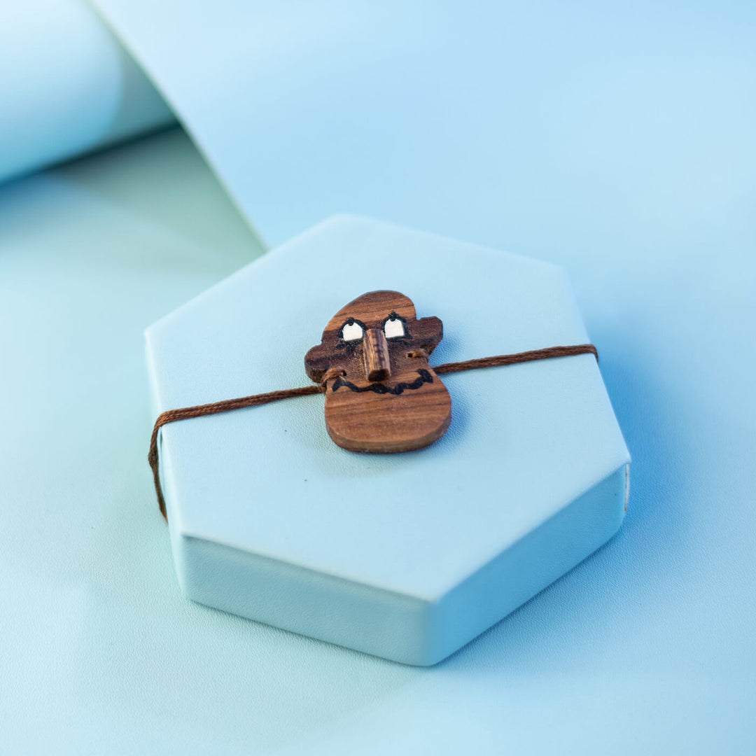 Handpainted Wooden Rakhi Icecream - Close-up on Bracelet Packaging (7)