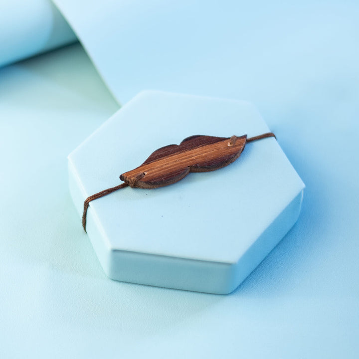Handpainted Wooden Rakhi Fish - Front View on Display Box (6)
