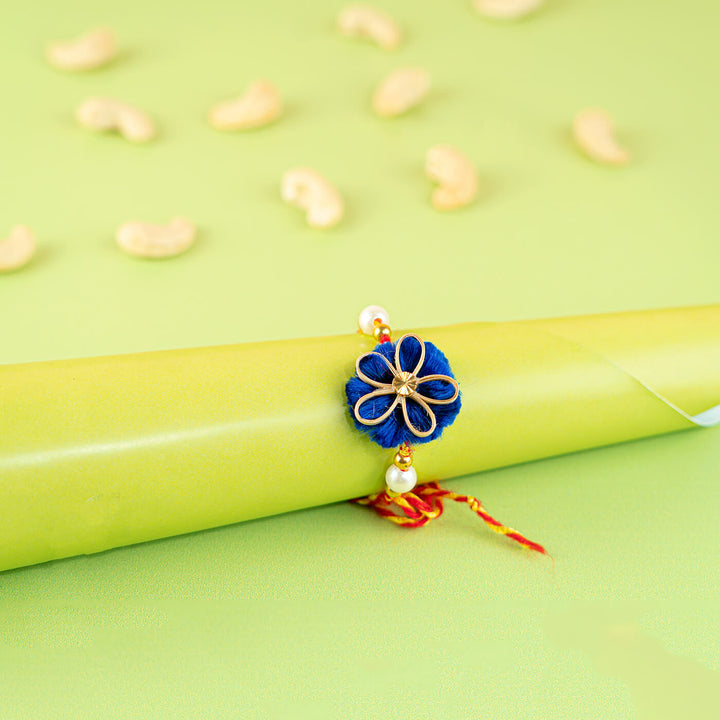 Ecofriendly Quilled Bamboo Rakhi With Golden Bead - Styled on Gift Roll