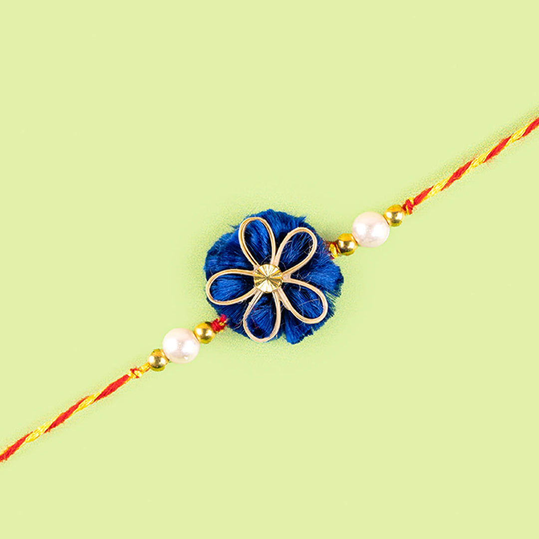 Ecofriendly Quilled Bamboo Rakhi With Golden Bead - Close-up of Decor Detail
