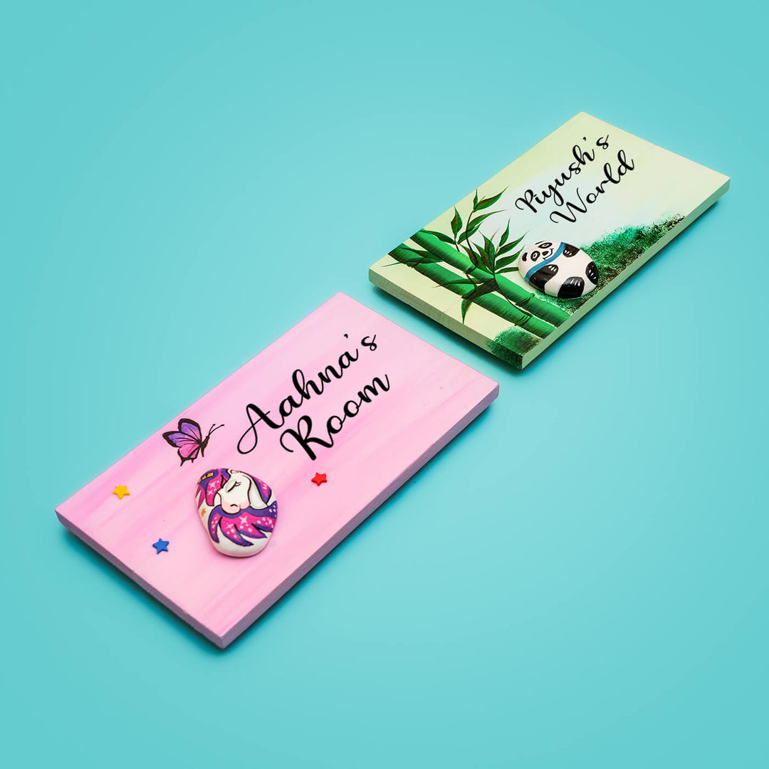 Handpainted Unicorn And Panda Pebble Art And Wood Kids Name Plate Set Of 2 - Angled Top View Showing Personalization