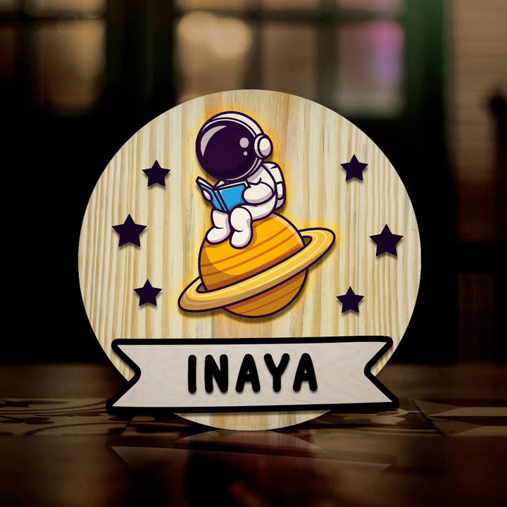 Kids Circular 3D Dino Astronaut Themed Name Plate With Lights - Name Personalization Example Front View