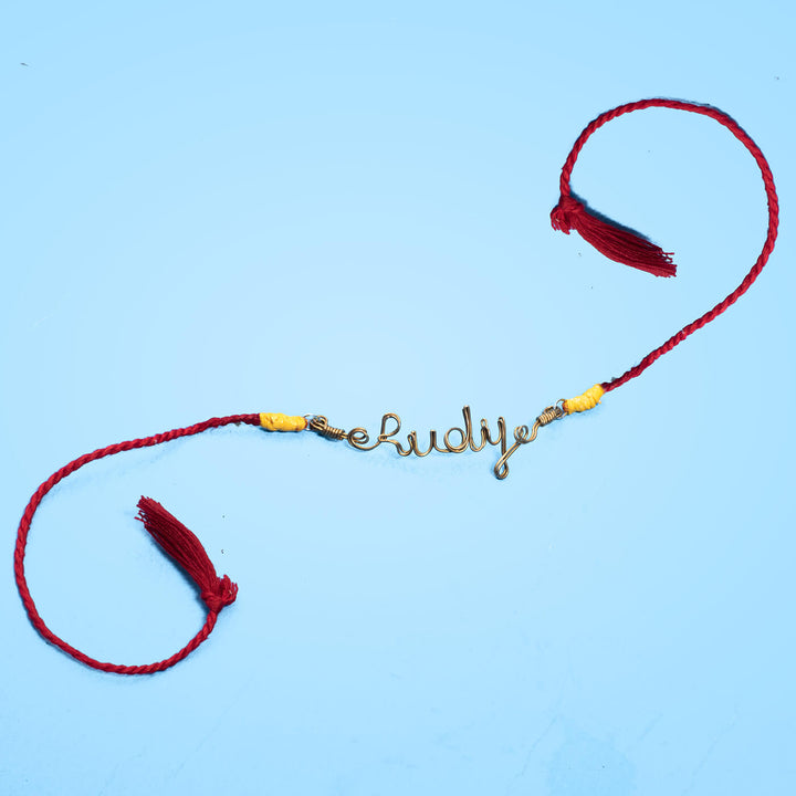Personalized Brass Lettering Rakhi With Roli Chawal