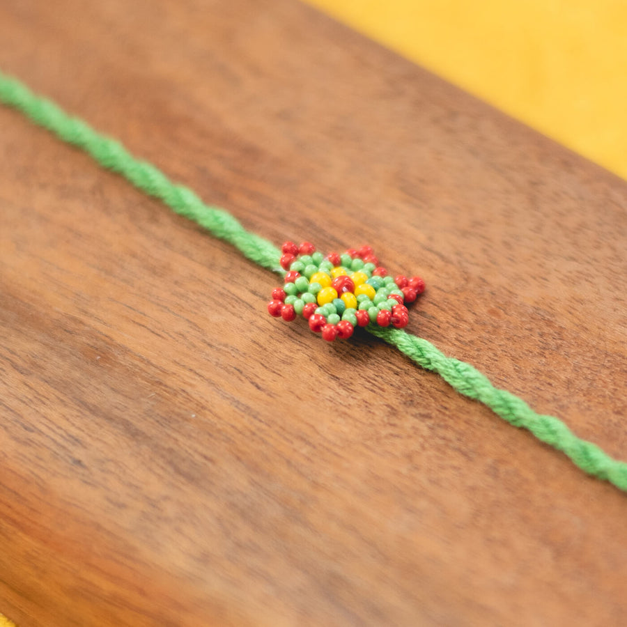 Sitara Collection Glass Beeds Rakhi Green - Close-up of beaded detail