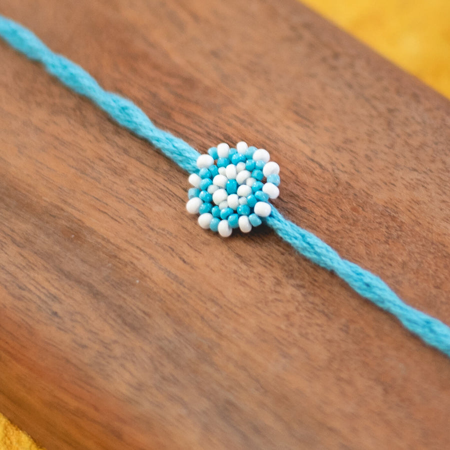 Chaand Collection Glass Beeds Rakhi Sky Blue - Close-up of Beaded Centerpiece