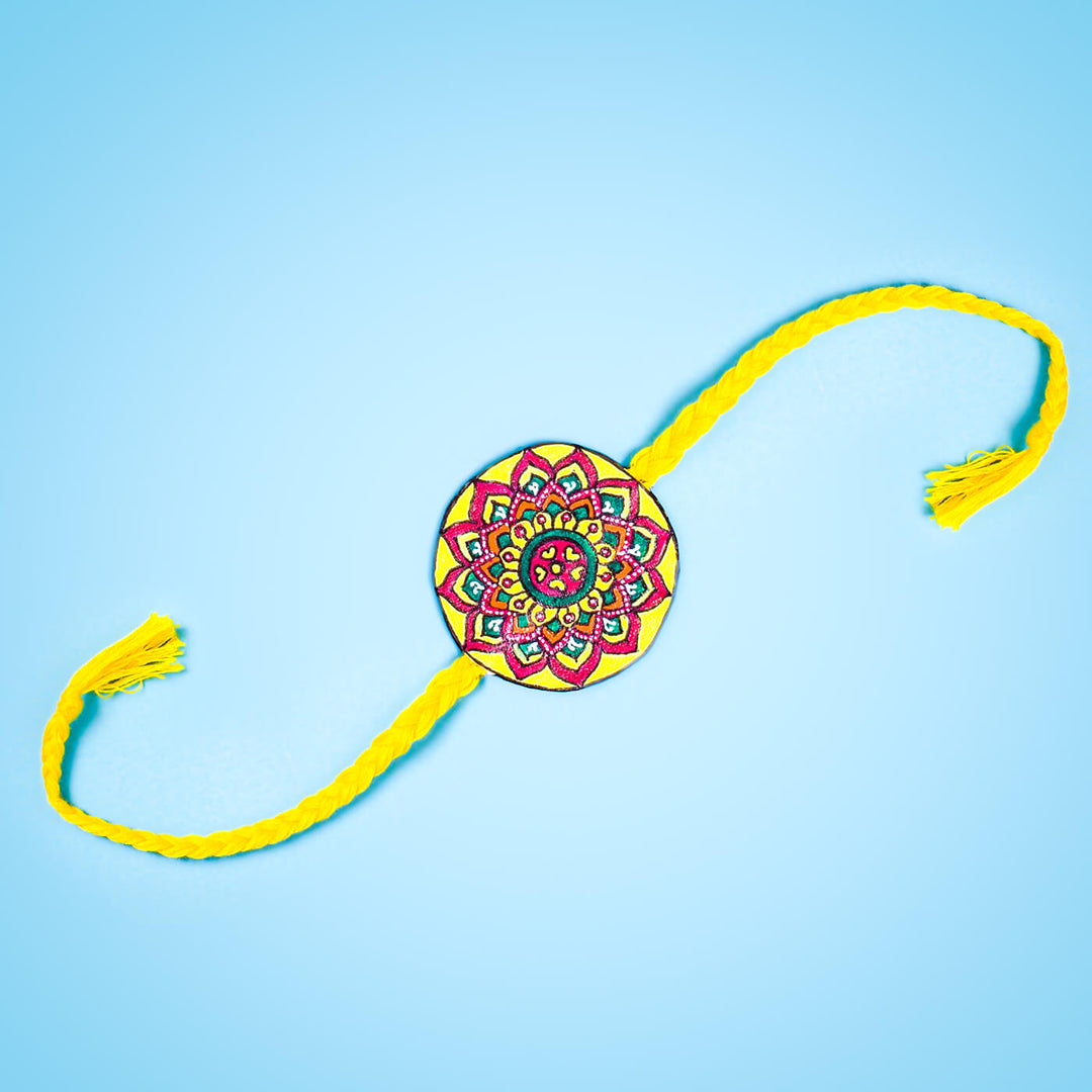 Hand-painted Eco-friendly Seed Rakhi with Roli Chawal - Yellow
