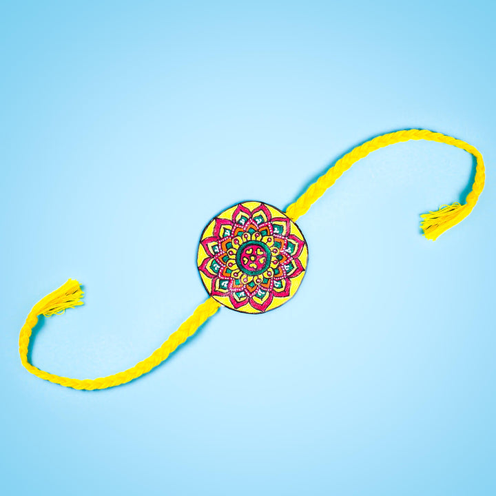 Hand-painted Eco-friendly Seed Rakhi with Roli Chawal - Yellow