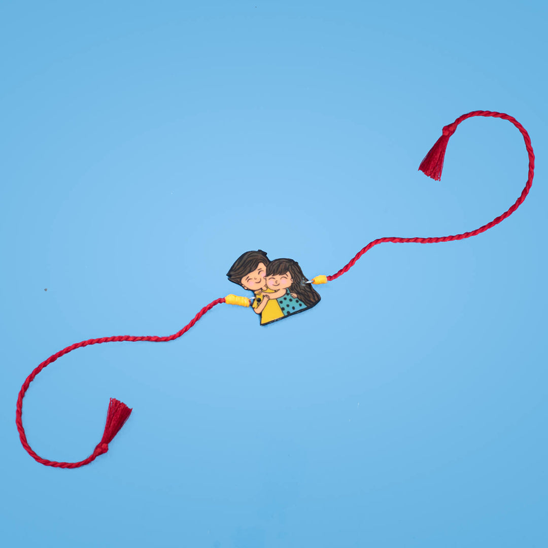 Handpainted Sibling Illustration Rakhi With Roli Chawal