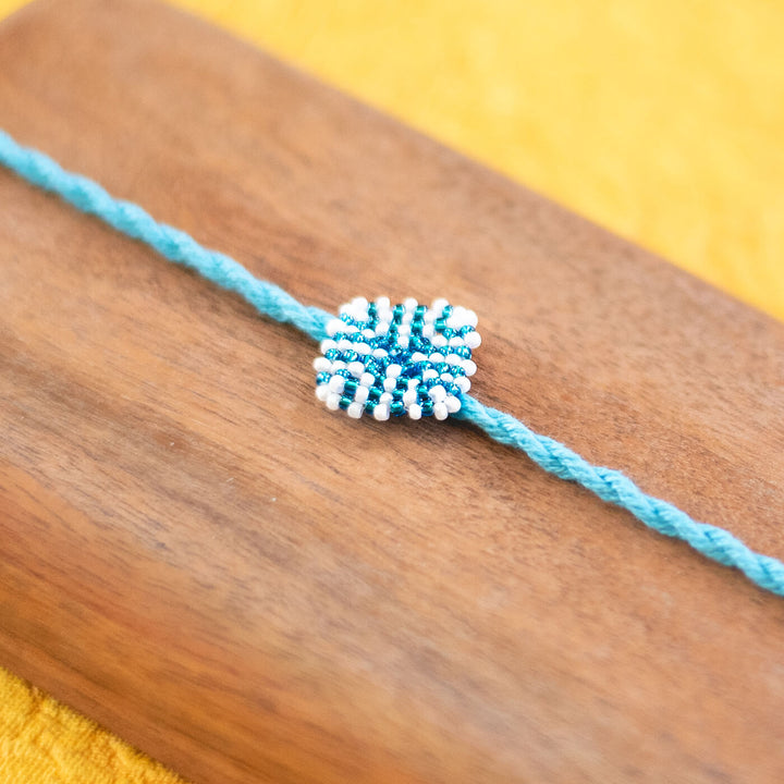 Raksha Collection Glass Beeds Rakhi Sky Blue - Close-up of bead detail