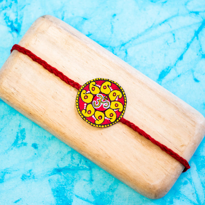 Hand-painted Eco-friendly Seed Rakhi with Roli Chawal - Red