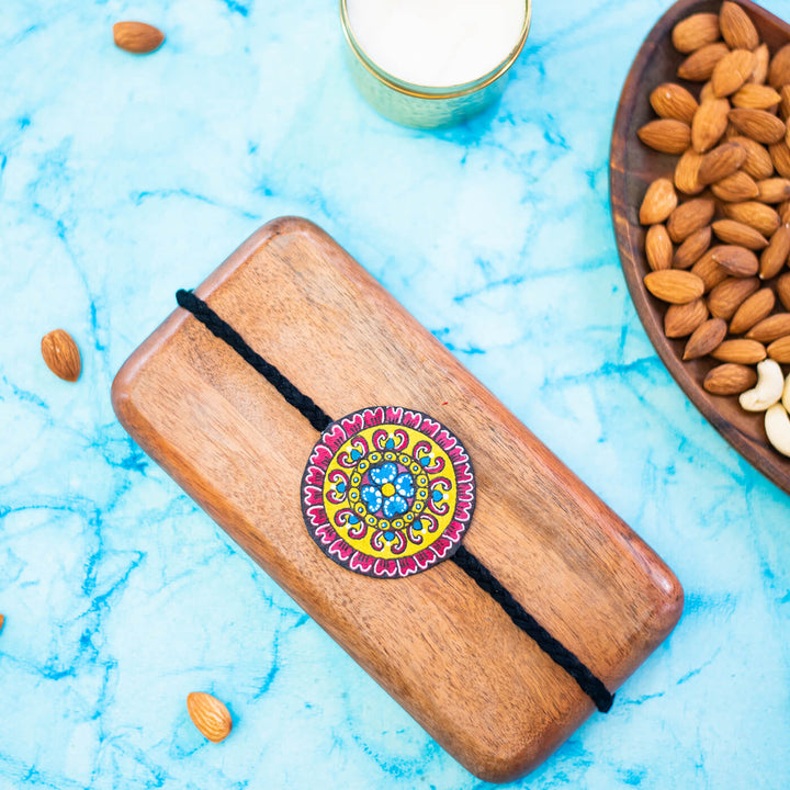 Hand-painted Eco-friendly Seed Rakhi with Roli Chawal- Black