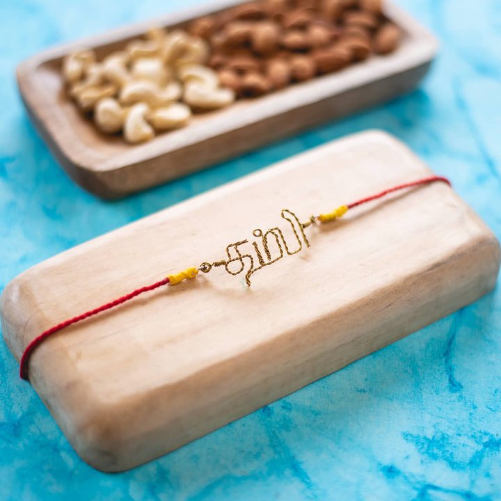 Personalized Brass Lettering Rakhi With Roli Chawal