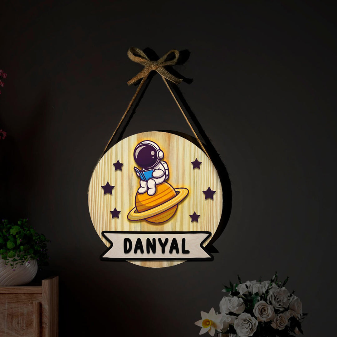 Kids Circular 3D Dino Astronaut Themed Name Plate With Lights - Hanging View with Name Personalization