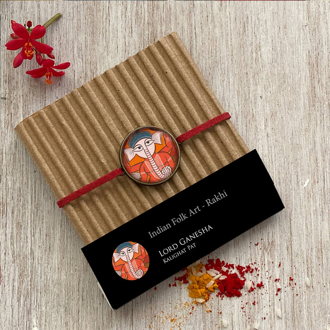 Lord Ganesha Kalighat Pat Folkart Rakhi - Packaging Display Front