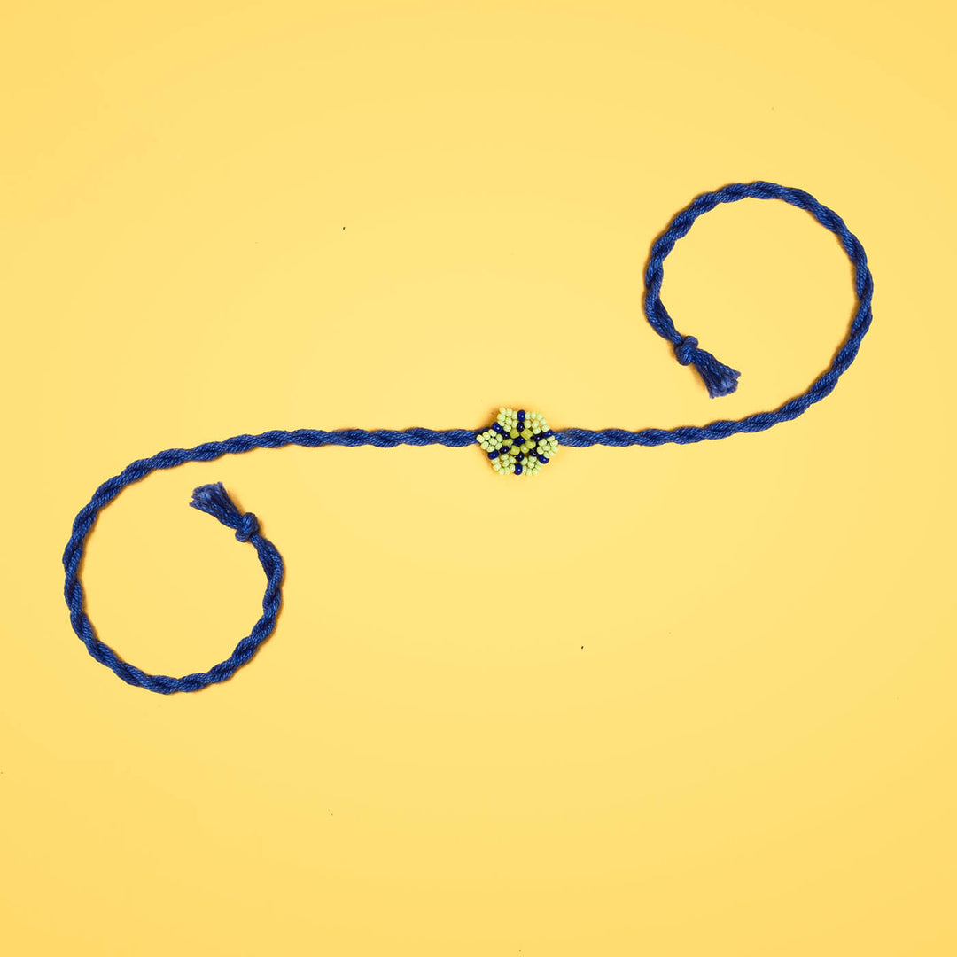 Phool Collection Glass Beeds Rakhi Indigo - Full View Showing Length and Ends