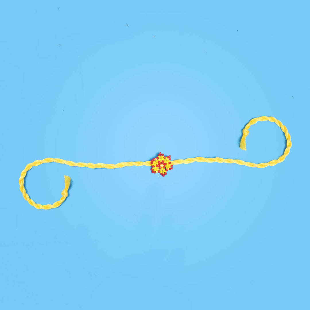 Phool Collection Glass Beeds Rakhi Yellow Red - Full Product Length Layout