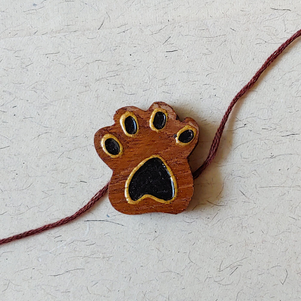 Handpainted Wooden Rakhi Paw - Front Close-up
