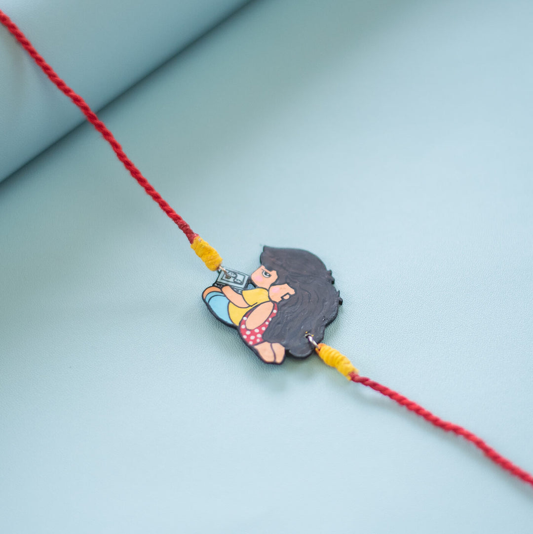 Handpainted Sibling Illustration Rakhi With Roli Chawal