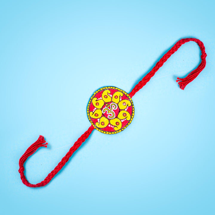Hand-painted Eco-friendly Seed Rakhi with Roli Chawal - Red