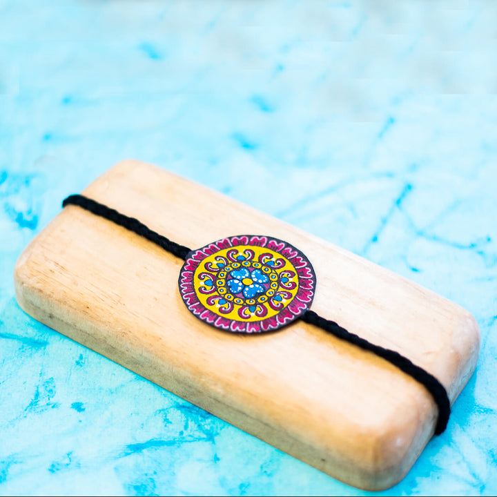 Hand-painted Eco-friendly Seed Rakhi with Roli Chawal- Black
