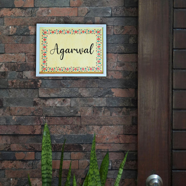 Handcrafted Framed Name Plate Family Name - Mounted on Brick Wall Close-up