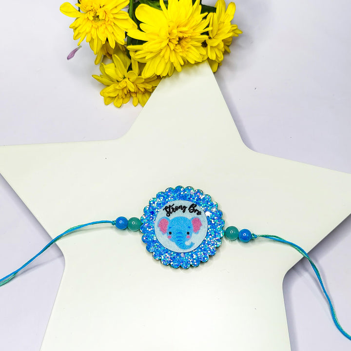 Sparkly Strong Bro Elephant Rakhi - Front View with Blue Elephant Design
