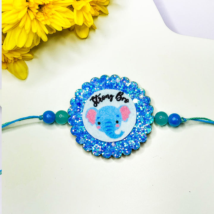 Sparkly Strong Bro Elephant Rakhi - Close-up of Blue Elephant Design
