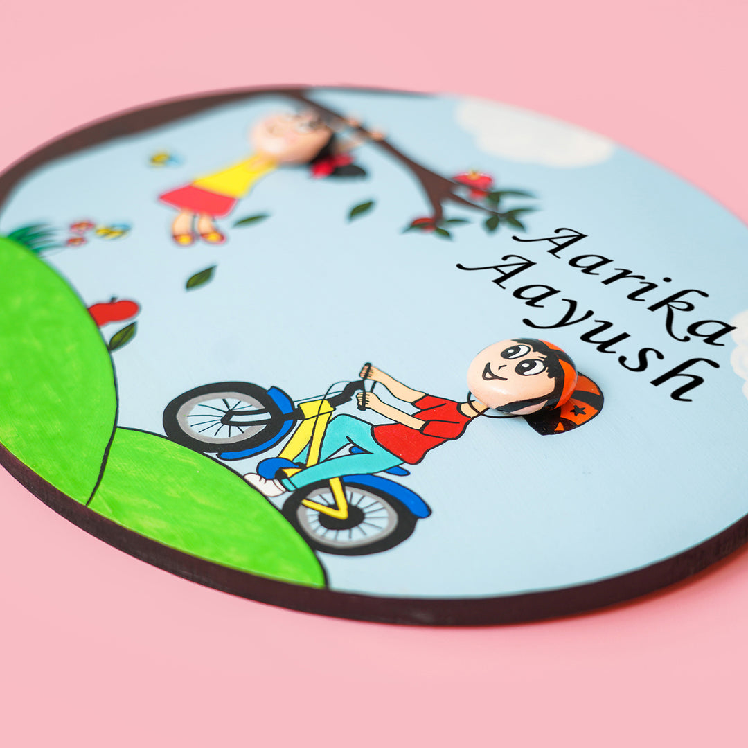 Handmade Clay Pebble Art Colourful Siblings Name Plate - Angled Close-up Showing Personalization