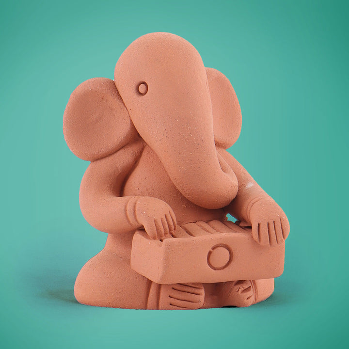 Handmade Terracotta Ganesh with Harmonium