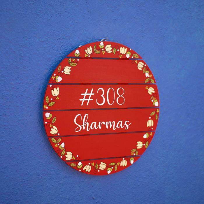 Coral Red Madhubani Circle Name Plate - Front View Mounted on Wall