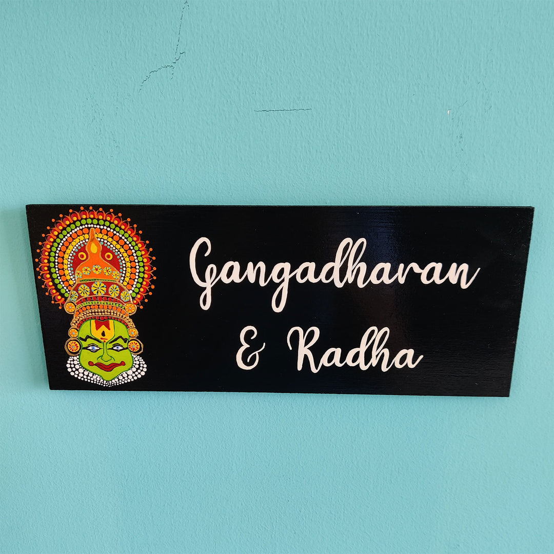Small Dot Art Name Plate Kathakali Motif Couple Names - Front View on Blue Wall