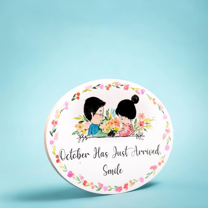 Oval Hand Painted Character Name Plate With Quote - Front View on Plain Background