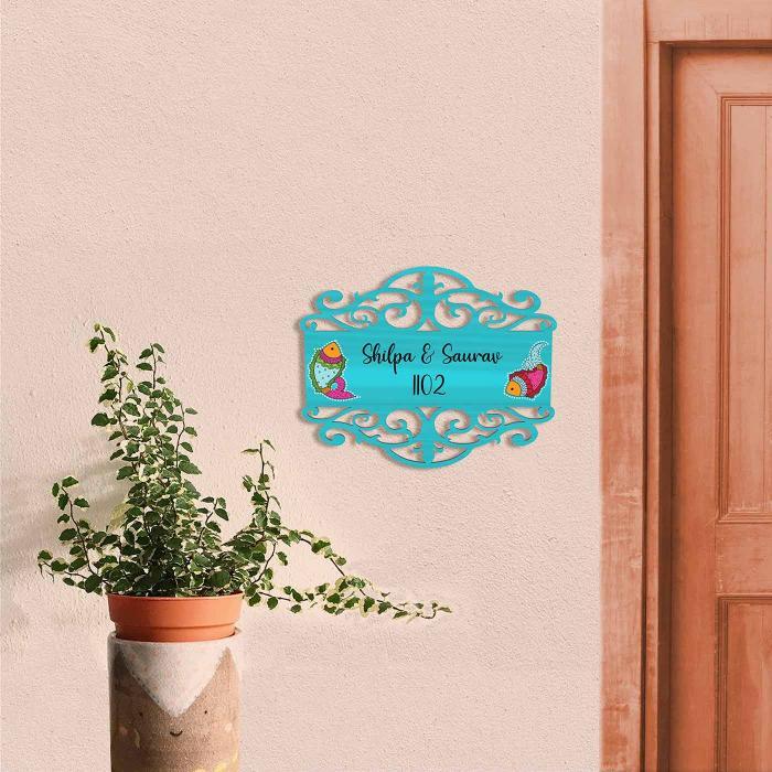 Teal Name Plate With Fish Design - Mounted on Exterior Wall Next Door